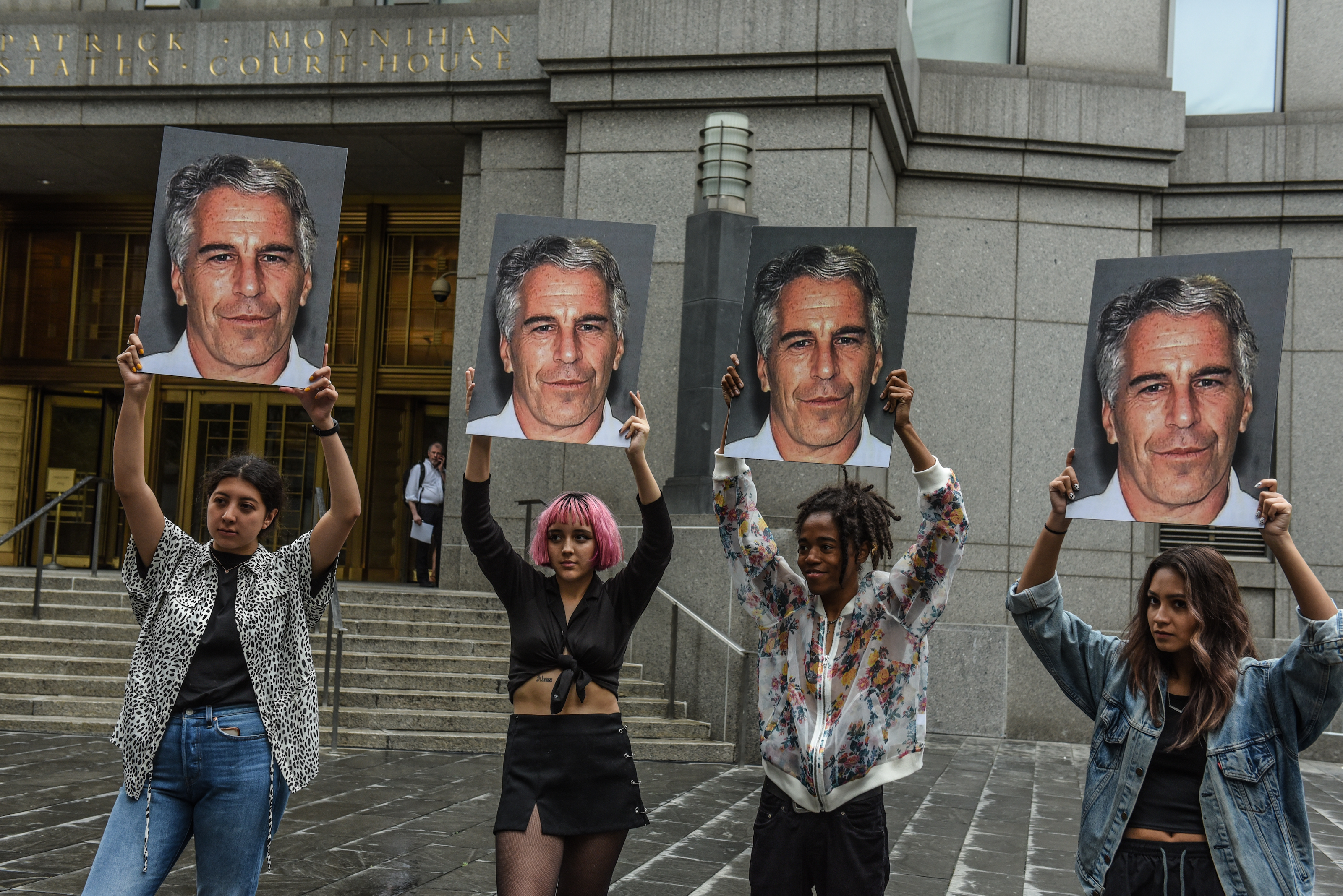 Jeffrey Epstein&#039;s face on four signs