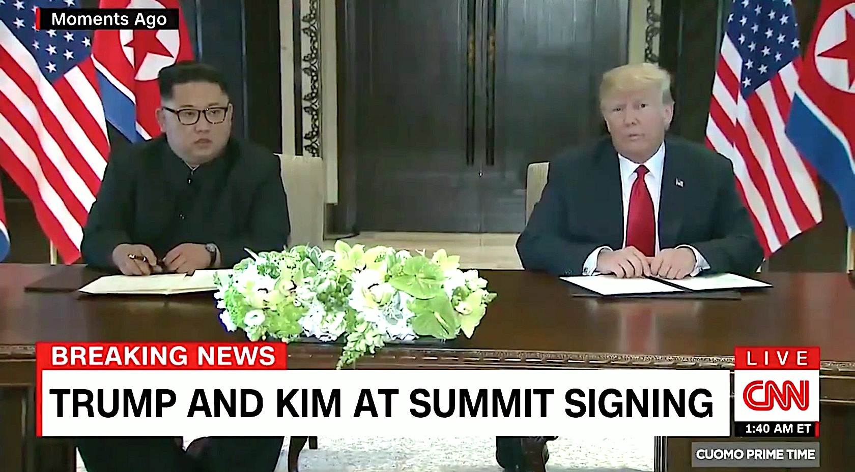 Trump and Kim sign some document