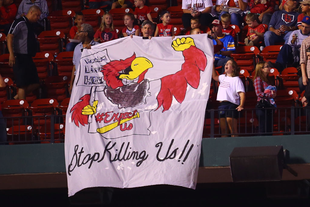 A banner protesting police brutality at a Cardinals game