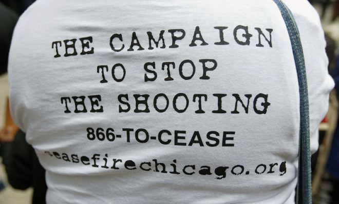 A t-shirt worn by an activist displays contact information for a gun control organization, in Chicago.