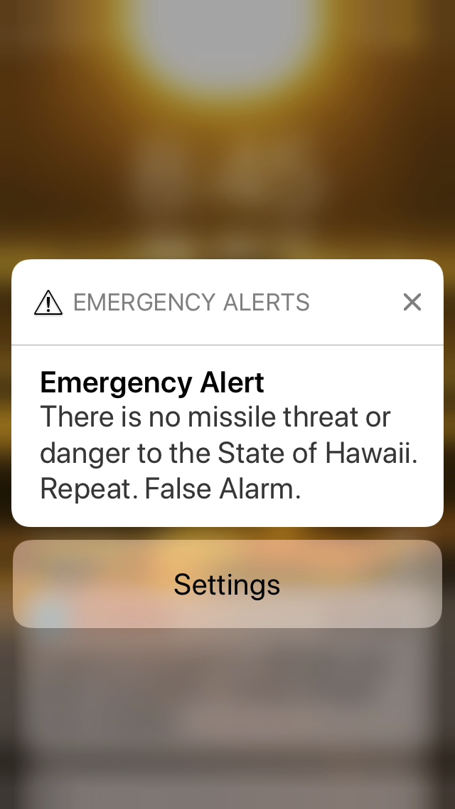 This smartphone screen capture shows the retraction of a false incoming ballistic missile emergency alert sent from the Hawaii Emergency Management Agency system on Saturday, Jan. 13, 2018. 