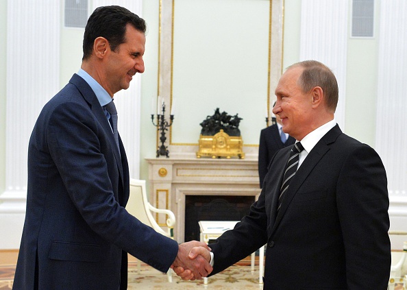 Bashar al-Assad and Vladimir Putin.