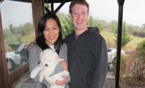 Facebook founder Mark Zuckerberg, with longtime girlfriend Priscilla Chan and their new puppy Beast, finally announced on Facebook that he is &quot;in a relationship.&quot;  