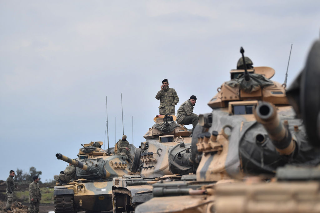 Turkish troops prepare to enter Syria