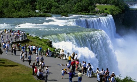 It may be overflowing with tourists, but Niagara Falls, N.Y., is seeing its population shrink as young residents move elsewhere in search of excitement and employment.