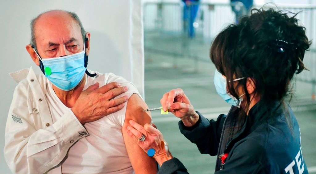 A man gets a coronavirus vaccine.