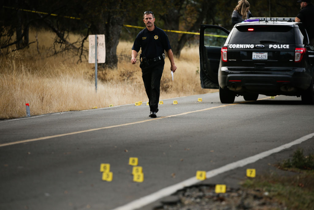 Law enforcement officer at a crime scene of the Tehama shooting.