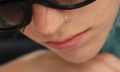 In some states, a nose ring is banned in schoolsâ€¦ unless the student can claim membership to the &quot;Church of Body Modification.&quot;
