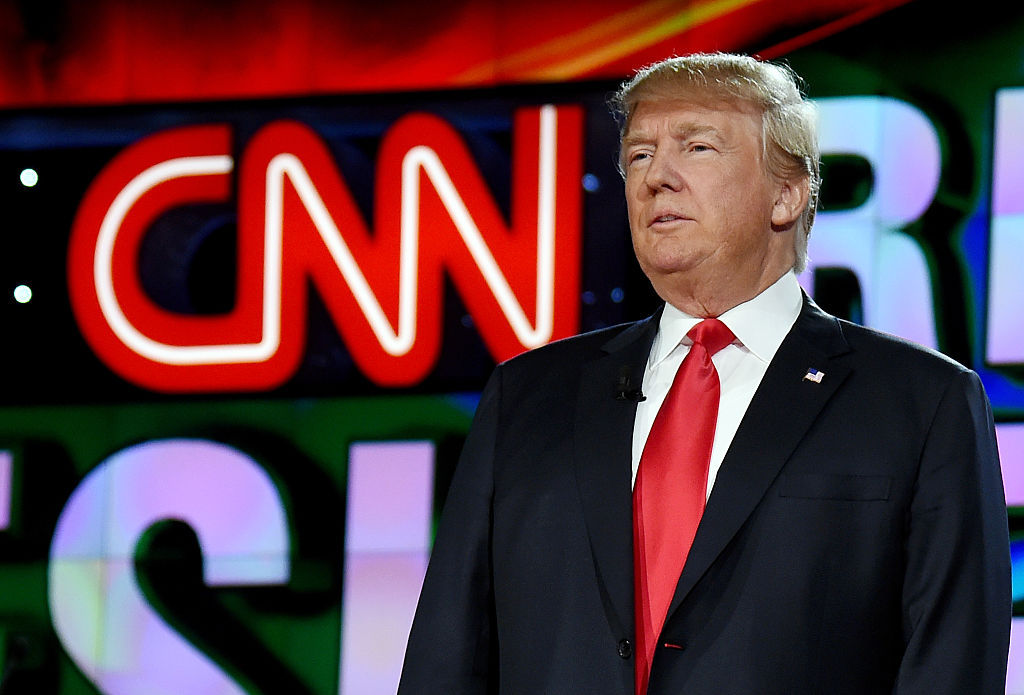 Donald Trump with a CNN logo