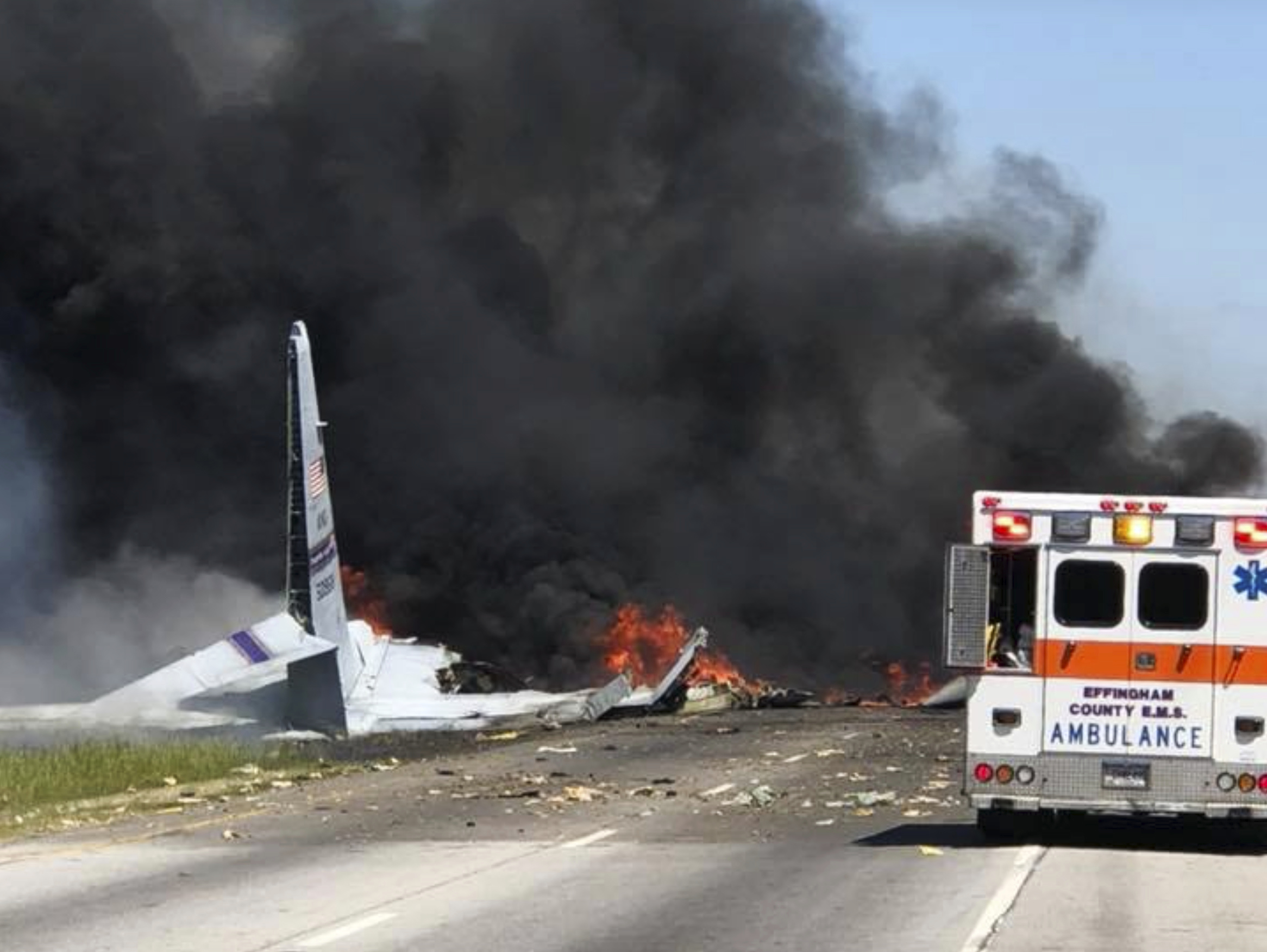 Flames and smoke rise from an Air National Guard C-130 cargo plane after it crashed near Savannah, Georgia, on Wednesday.
