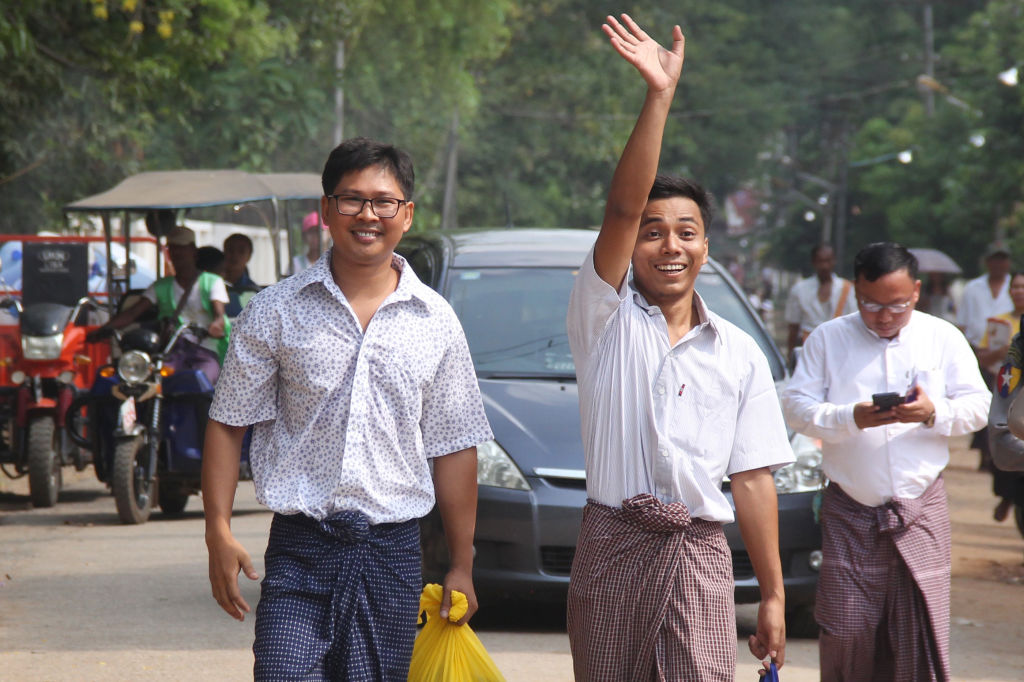Reuters journalist Kyaw Soe Oo and Wa Lone walk out of prison