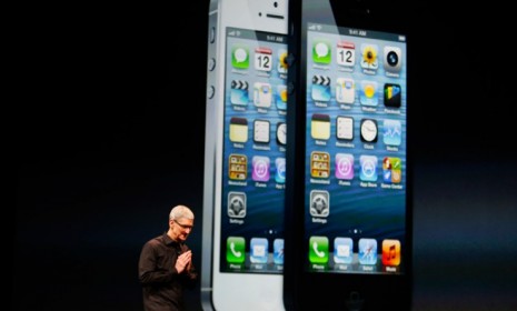 Apple CEO Tim Cook unveils the iPhone 5, which is smaller, lighter, and faster than its predecessor.