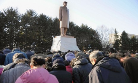 Pyongyang residents mourn the death of Kim Jong Il