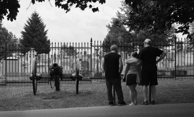 Visitors to the Soldiers&#039; National Cemetery stand in front of the site of Abraham Lincoln&#039;s Gettysburg Address on July 2, 2013 in Gettysburg, Pennsylvania.