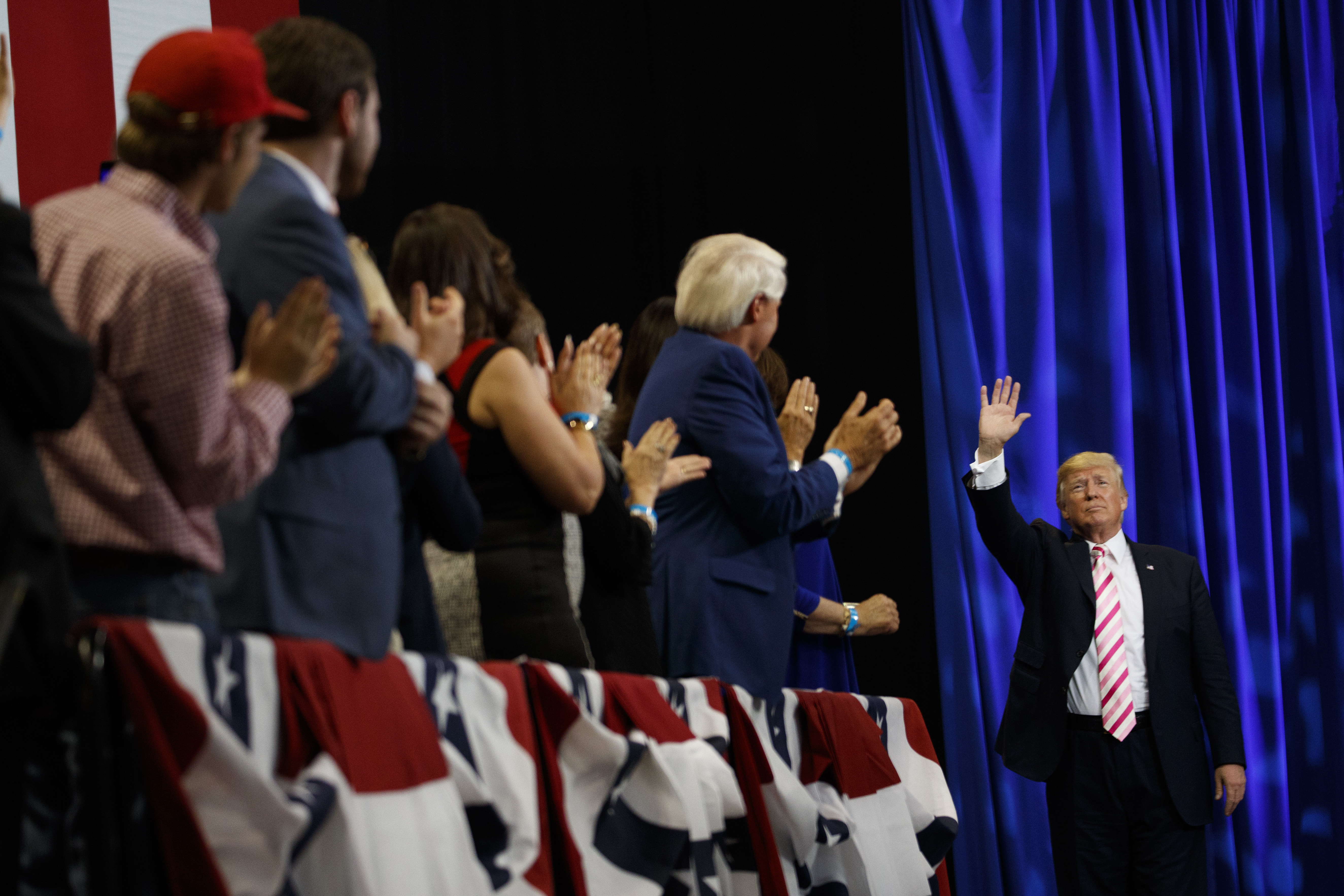 Donald Trump waves to supporters.