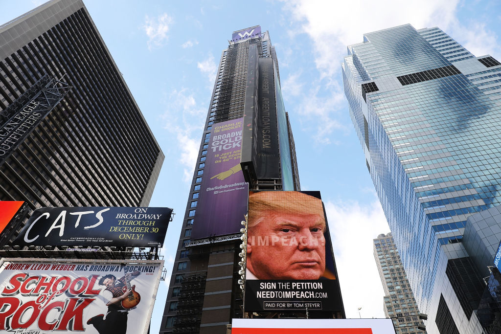 A billboard calling for Trump&#039;s impeachment up in Times Square.