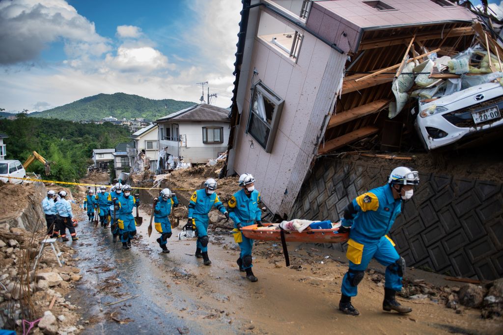 Police in Japan&#039;s Hiroshima prefecture respond to mudslides