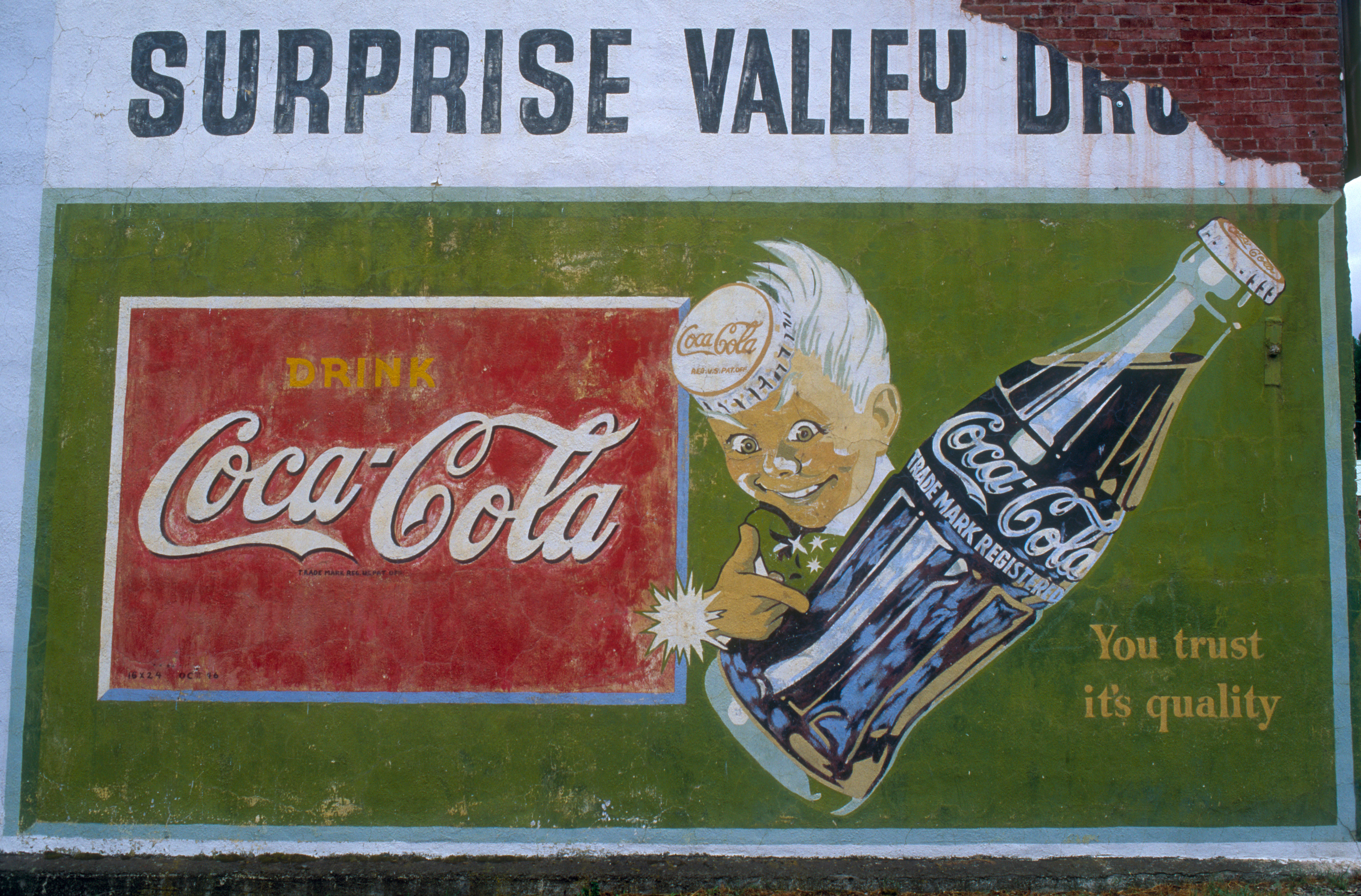 A retro-looking Coca-Cola billboard.