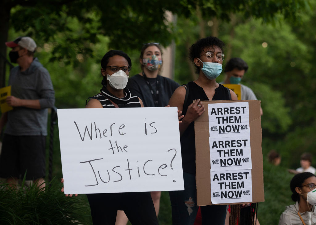 A group of protesters gather outside the home of Hennepin County Attorney Mike Freeman on May 28, 2020