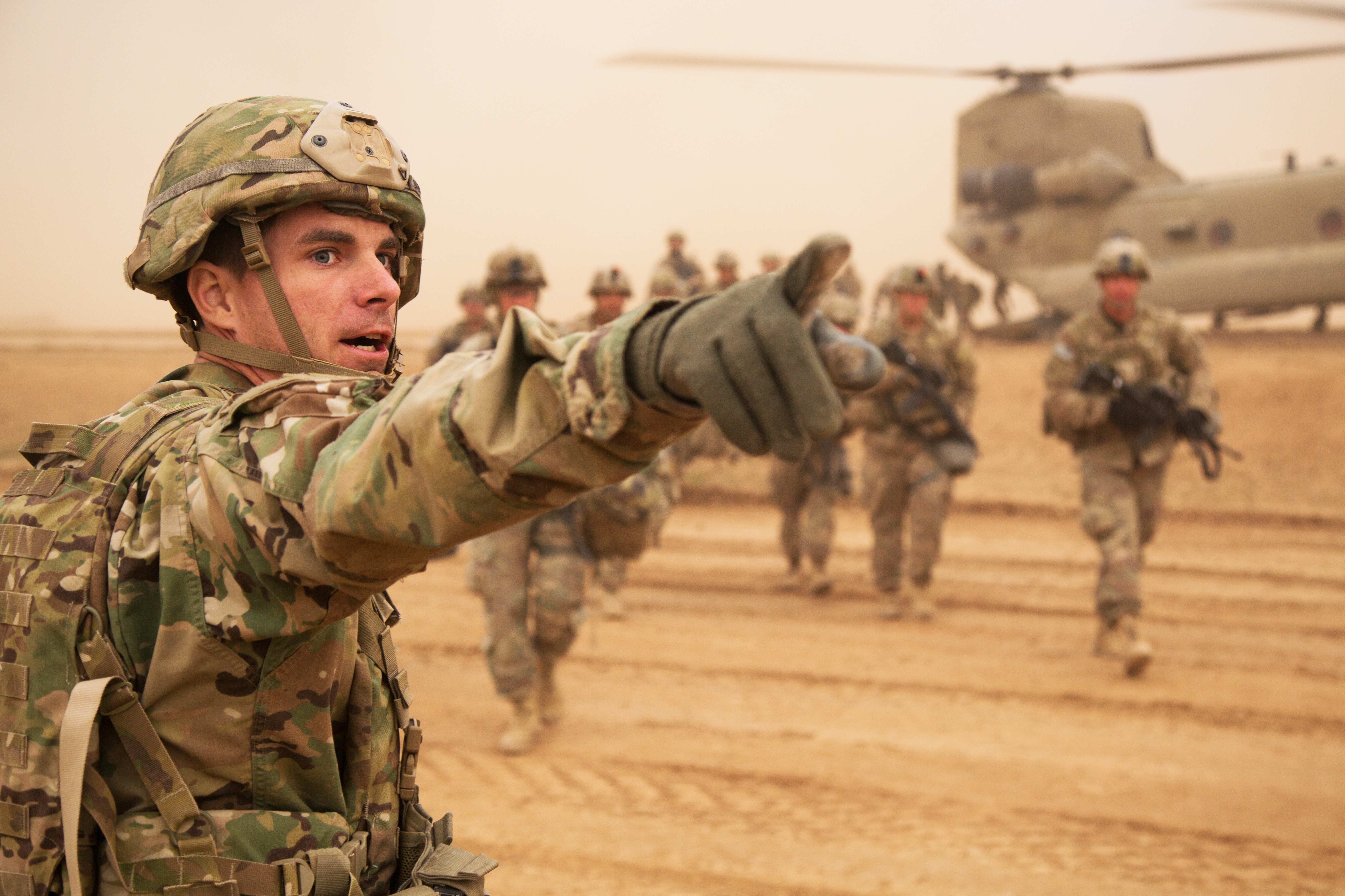U.S. Army Cpt. Andrew Roberts directs newly arrived paratroopers where to go near Mosul, Iraq, Feb. 5, 2017.