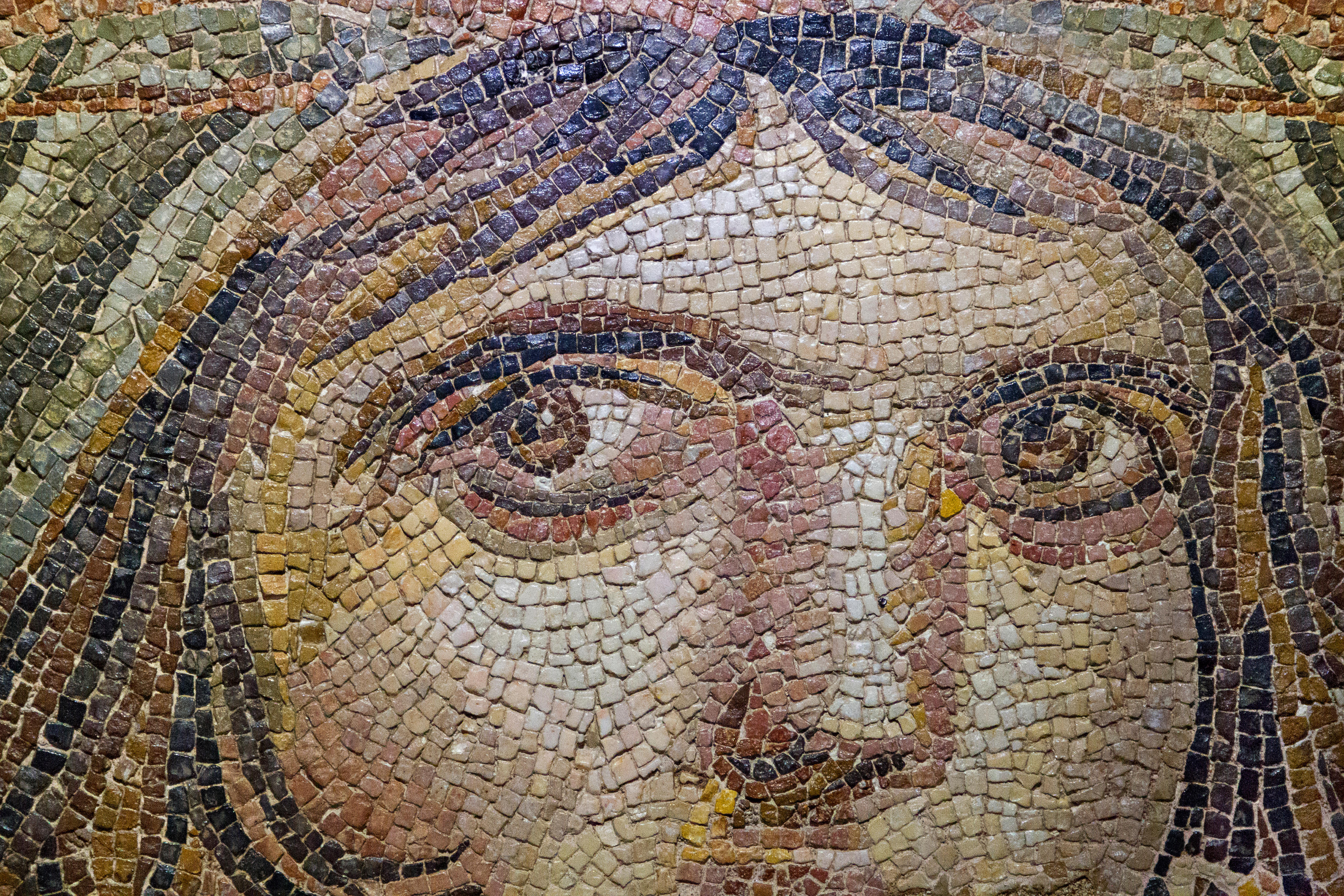 A mosaic representation of a Maenad. 