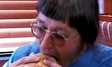 Don Gorske bites into his 25,0000 Big Mac, defying all nutritional odds by living on a nearly all-burger diet that he doesn&#039;t see ending any time soon.