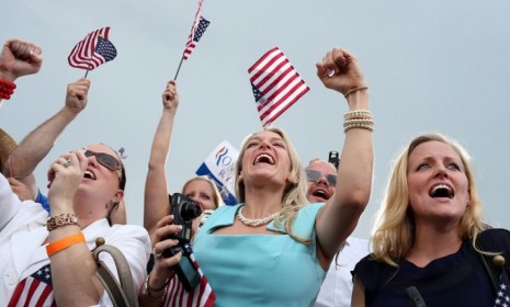 Supporters of Mitt Romney cheer during a rally in Port St. Lucie, Fla. on Oct. 7.