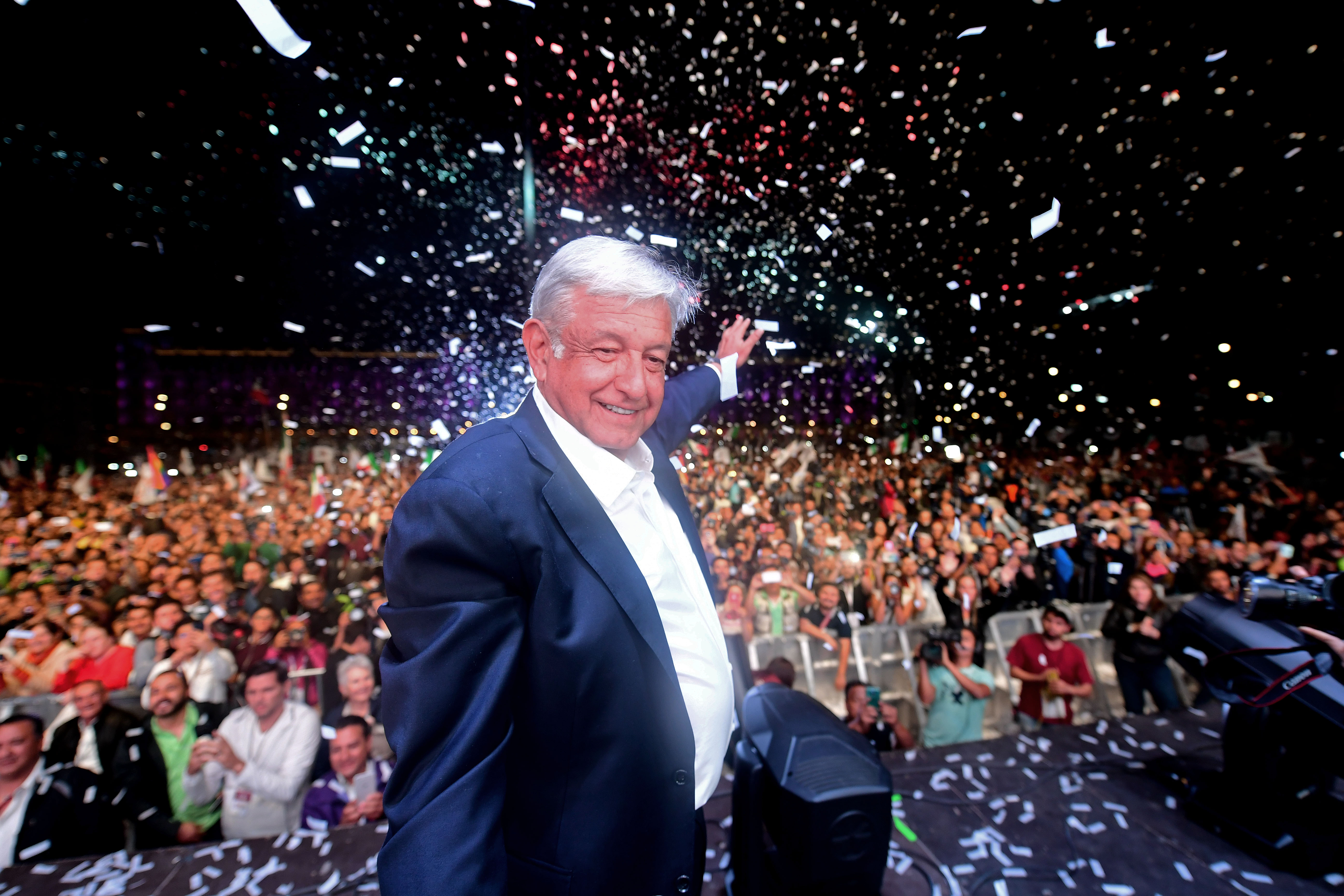 Andres Manuel Lopez Obrador waves to supporters