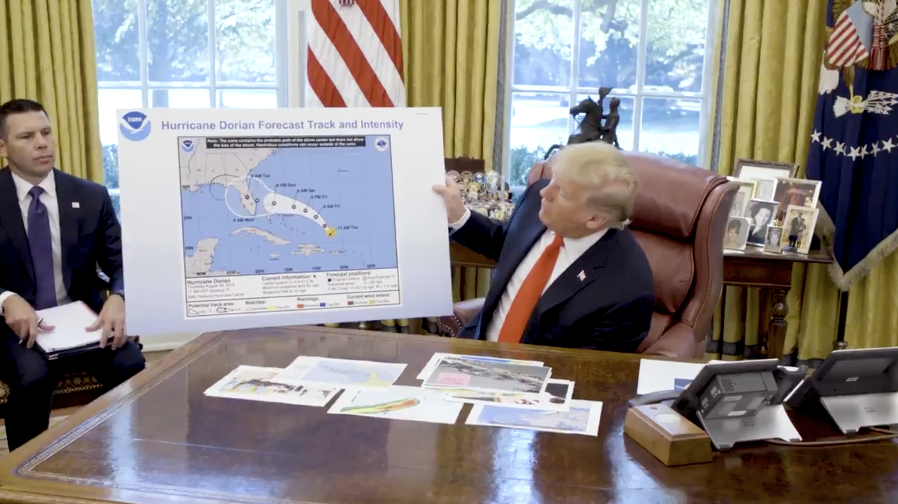 Trump with a doctored map of Dorian&#039;s projection.