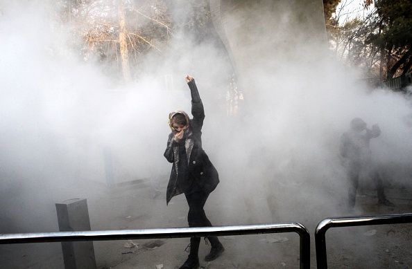 A woman protests at the University of Tehran.