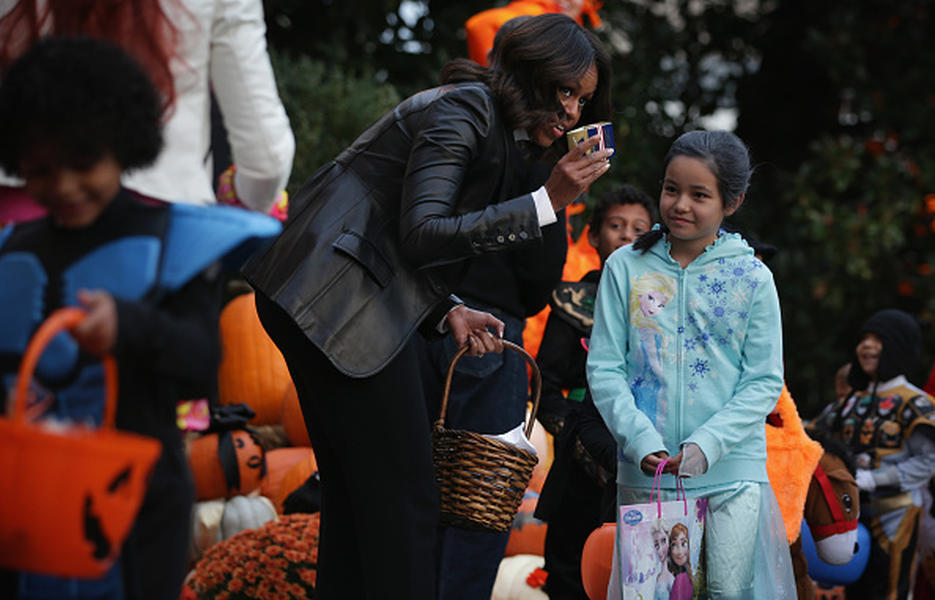 Anti-junk food campaigner Michelle Obama gave out Halloween candy