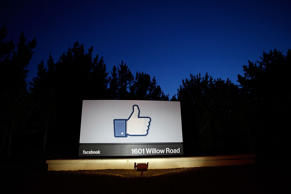 A &#039;like&#039; sign stands at the entrance of Facebook headquarters May 18, 2012 in Menlo Park, California. 