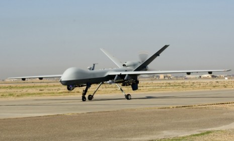 A U.S. Air Force Reaper drone: A virus that records computer keystrokes has infected a fleet of military drones, and some suspect that secret data may have been captured.