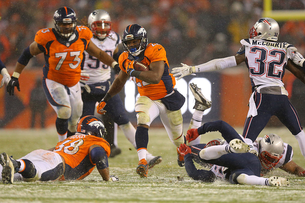 C.J. Anderson of the Denver Broncos runs in the winning touchdown versus the New England Patriots