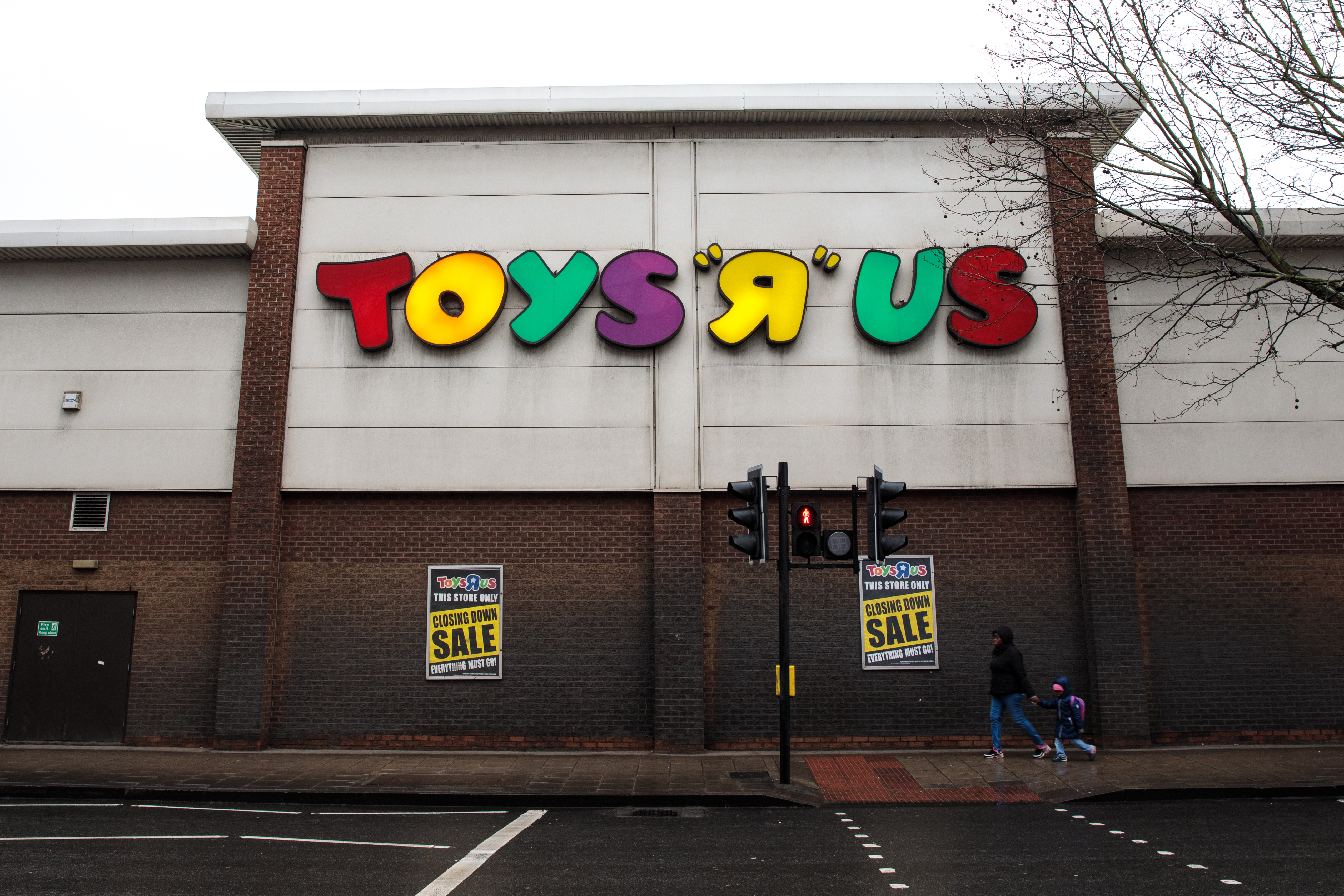 A Toys R US covered in &#039;closing&#039; signs