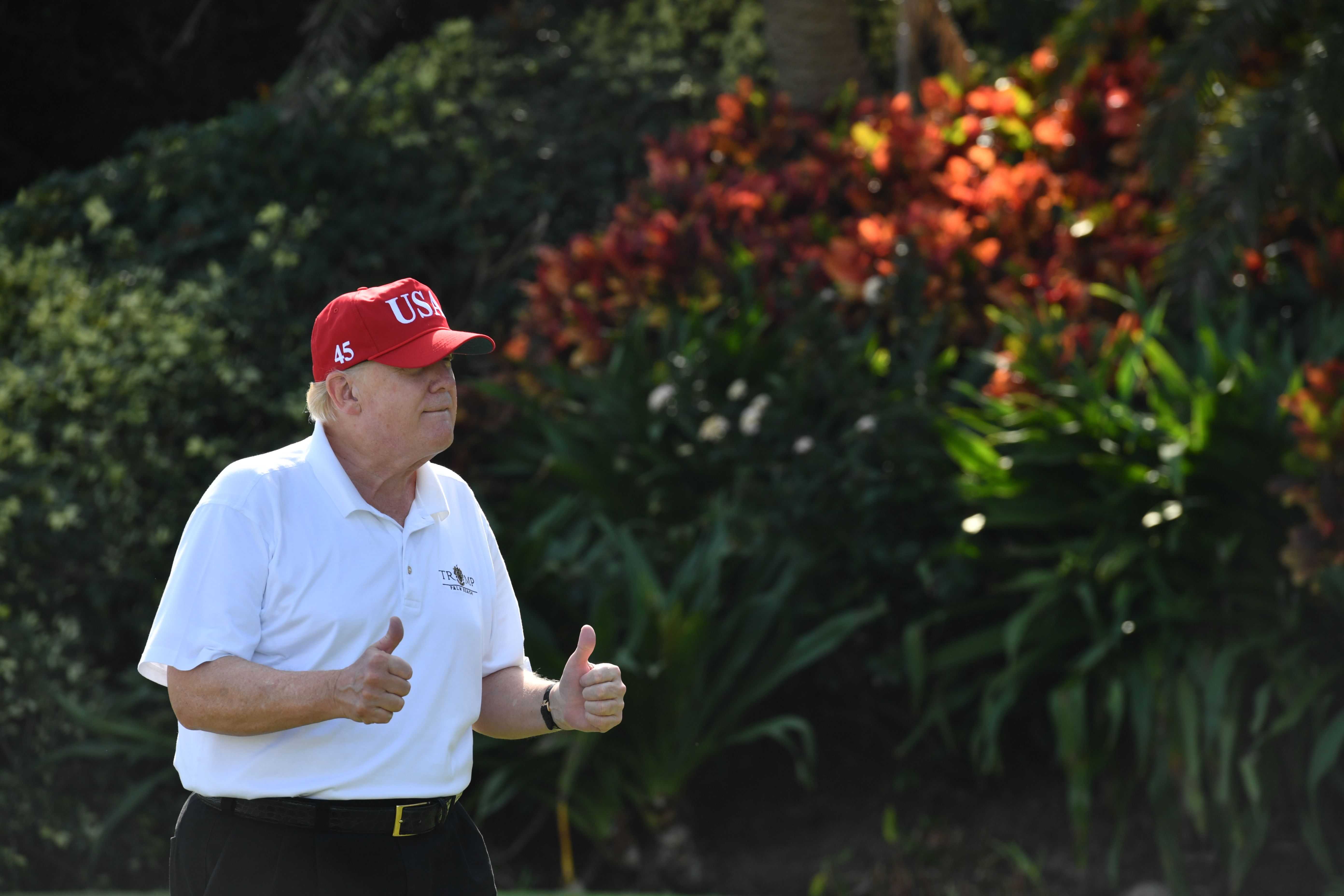 President Trump plays golf