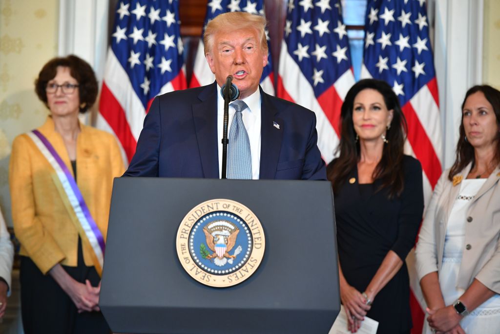 US President Donald Trump speaks as he takes part in the signing of a proclamation on the 100th anniversary of the ratification of the 19th Amendment during an event in the Blue Room of the W