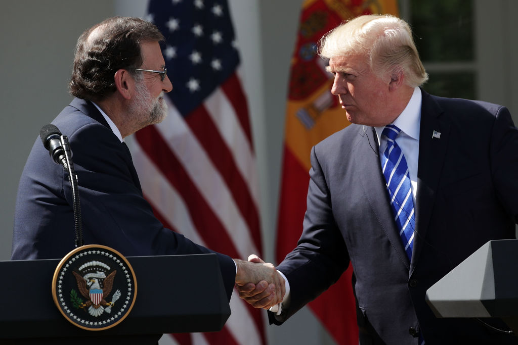 Trump shakes hands with Spanish Prime Minister Mariano Rajoy