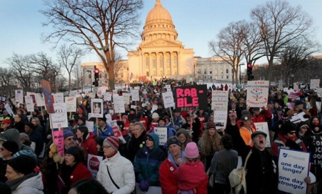 Pro-union protesters stage an all-out war on Wisconsin Republicans and Gov. Scott Walker after they passed legislation that cuts benefits for public sector workers.