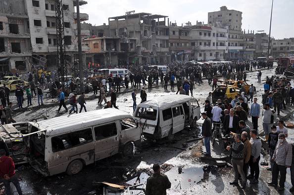Site of a double car bombing in Syria