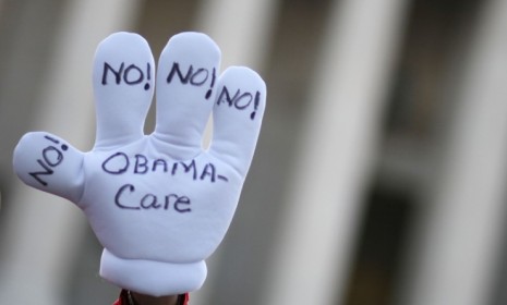 Demonstrators protest against President Obama&#039;s health care reform law: A new poll suggests two-thirds of Americans want all or part of the law overturned.
