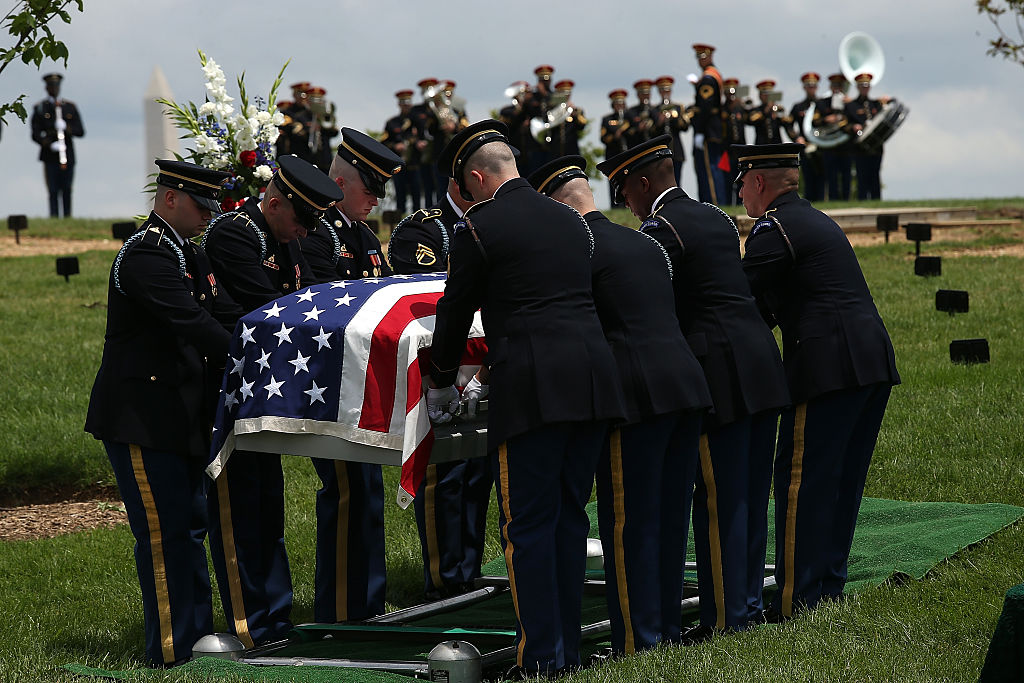 The burial of U.S. Army Sgt. Joseph Snock, who died while in a prisoner of war camp after being wounded in battle in late November or early December in 1950 in North Korea.