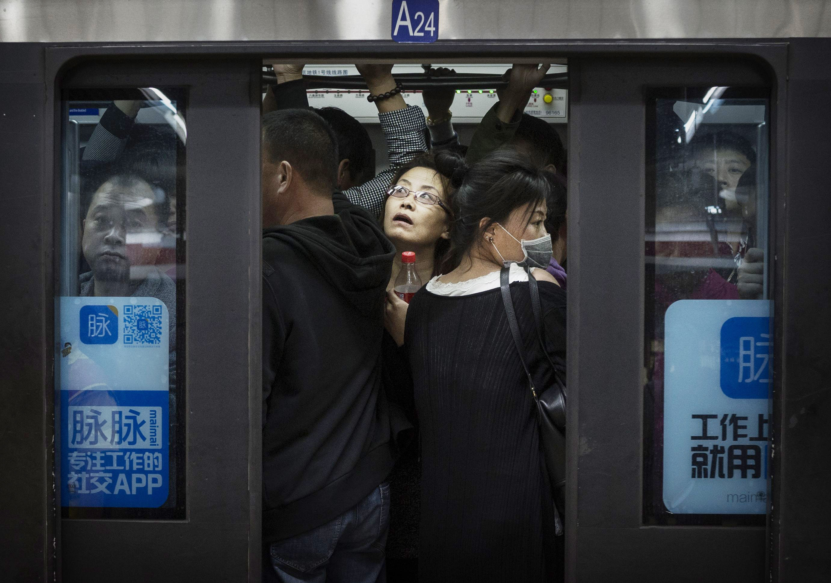 Commuters in Beijing. 