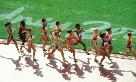 Runners compete at the 2000 Olympics: Screening for female gender was banned before the 2000 games for scientific and ethical reasons, but may soon be resurrected.