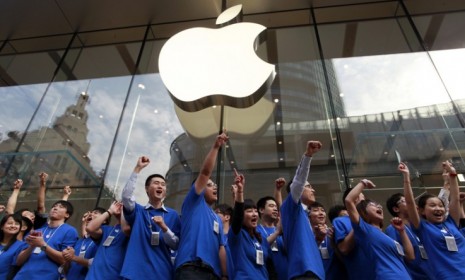 Employees at the recently opened Apple store in Shanghai