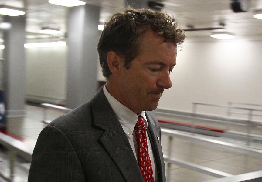 Watch Rand Paul ditch his meal to flee from immigration activists