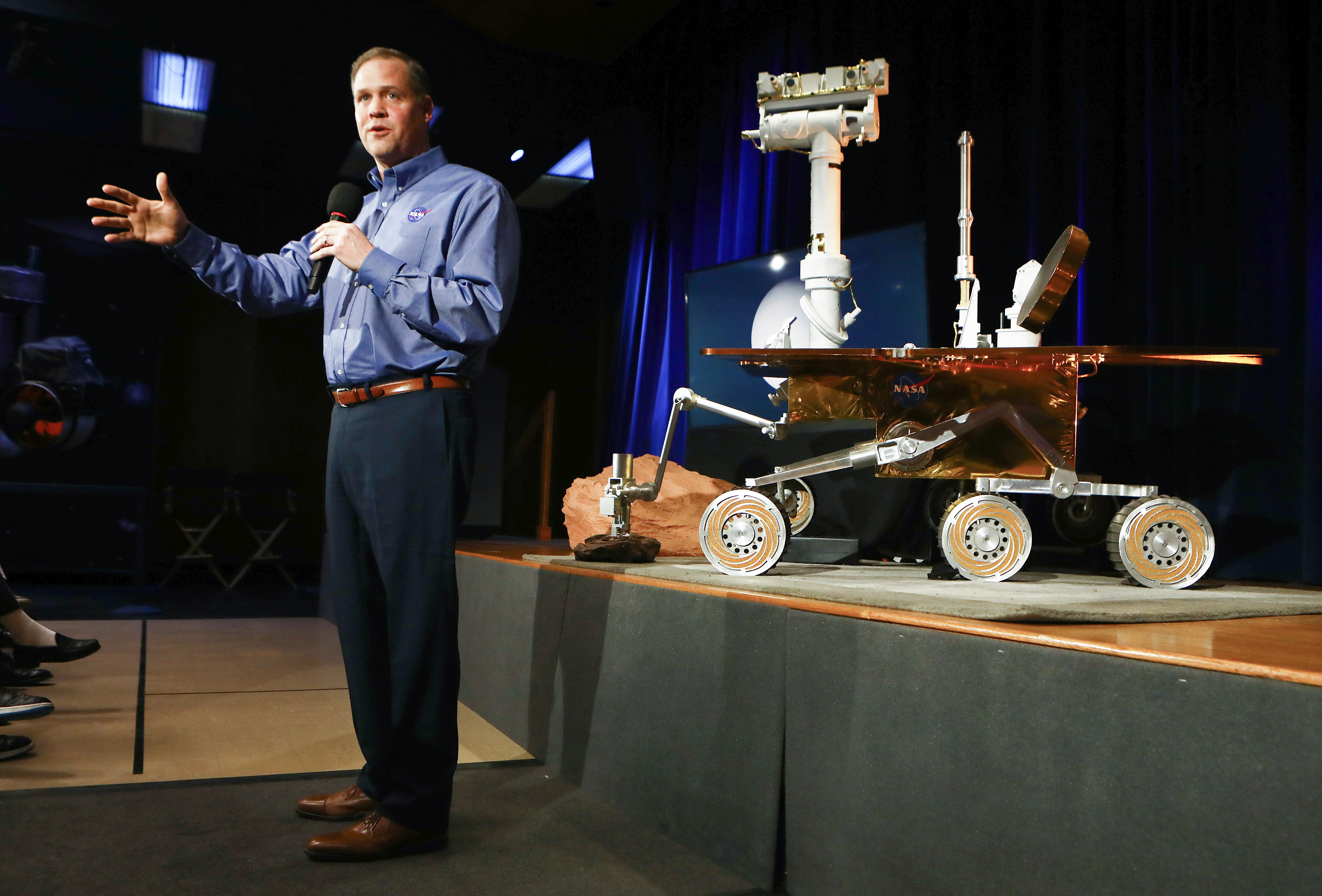 NASA Administrator Jim Bridenstine and a Mars rover.
