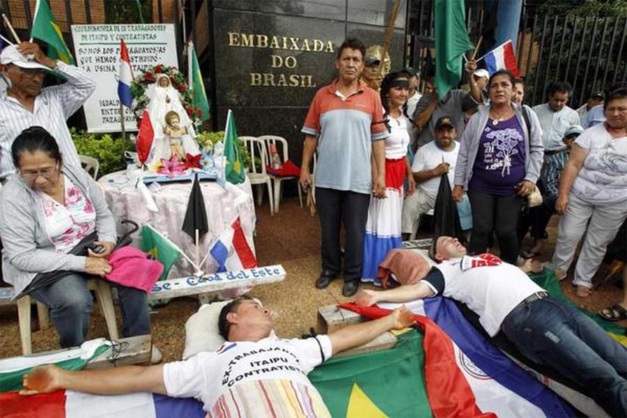 Protesters in Paraguay nail themselves to crosses