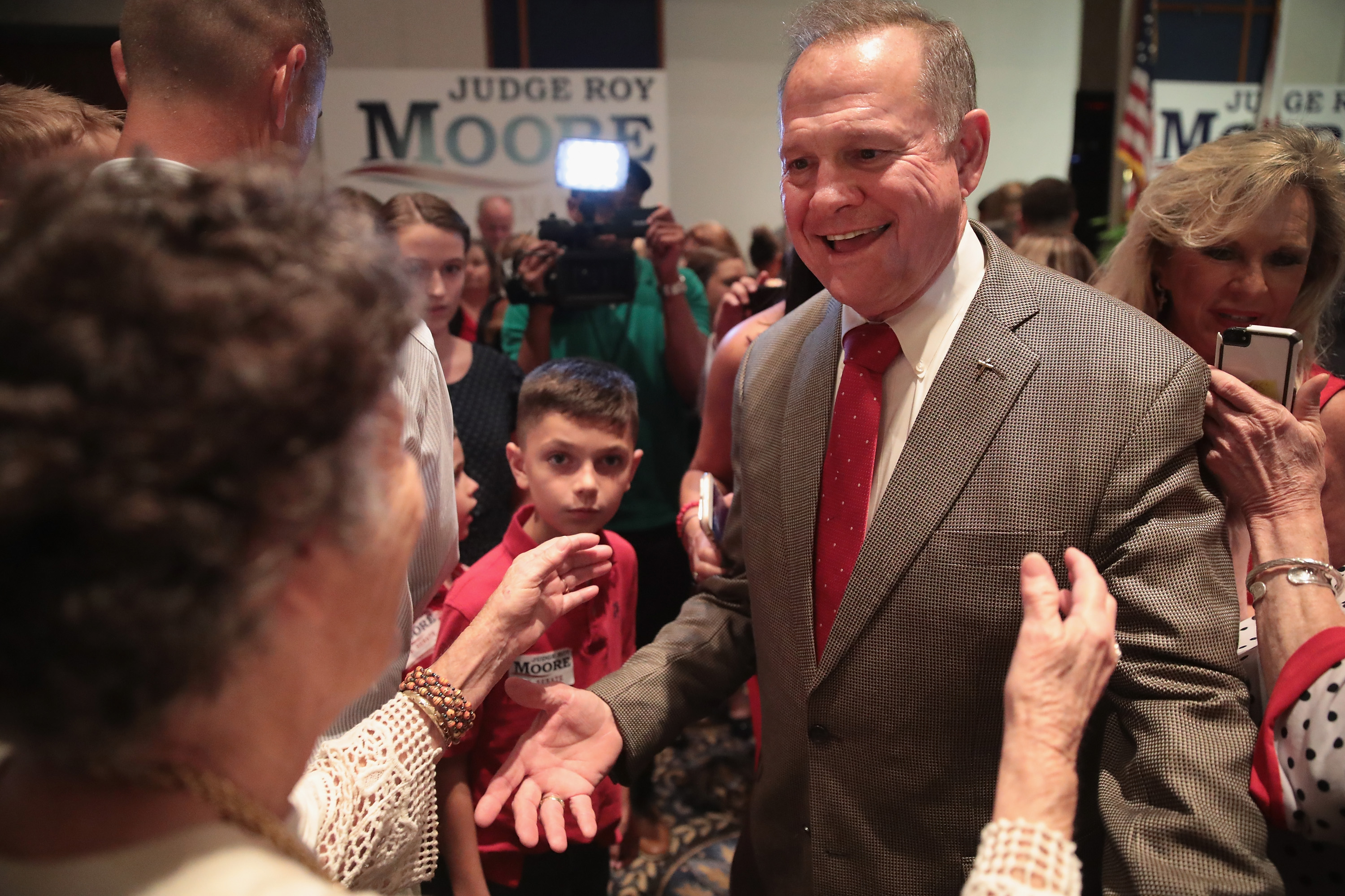 Roy Moore greets supporters