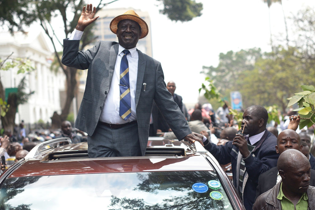 Kenyan opposition candidate Raila Odinga celebrates high court ruling